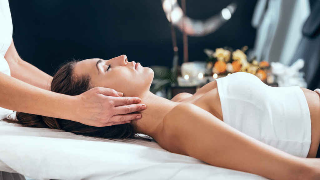 Woman receiving a relaxing massage at spa.