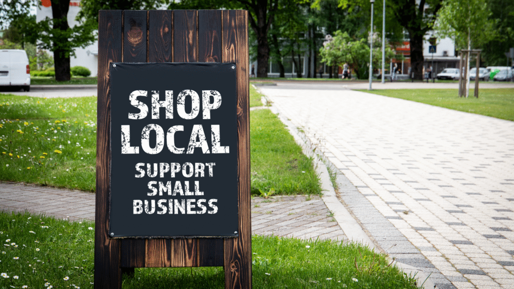 Sign reads Shop Local Support Small Business
