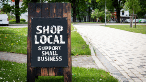 Sign reads Shop Local Support Small Business