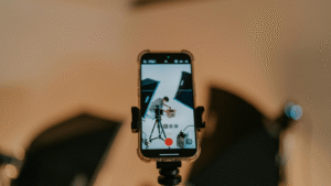 Smartphone filming a studio photoshoot setup